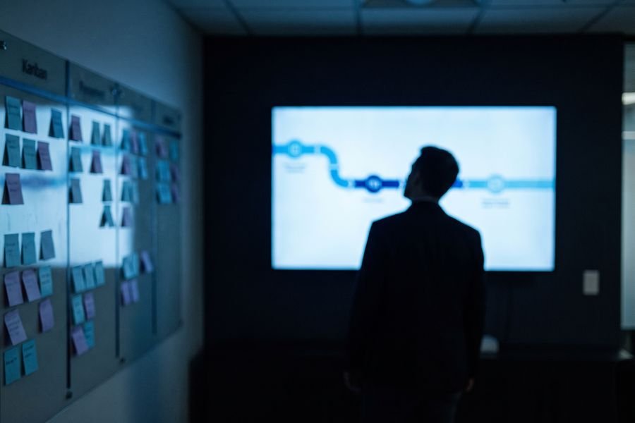 A pipeline dashboard glowing in a startup office